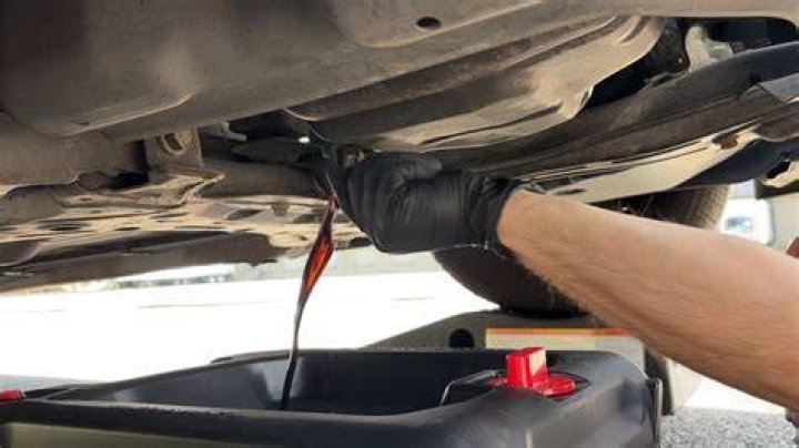 How do you drain oil out of a car